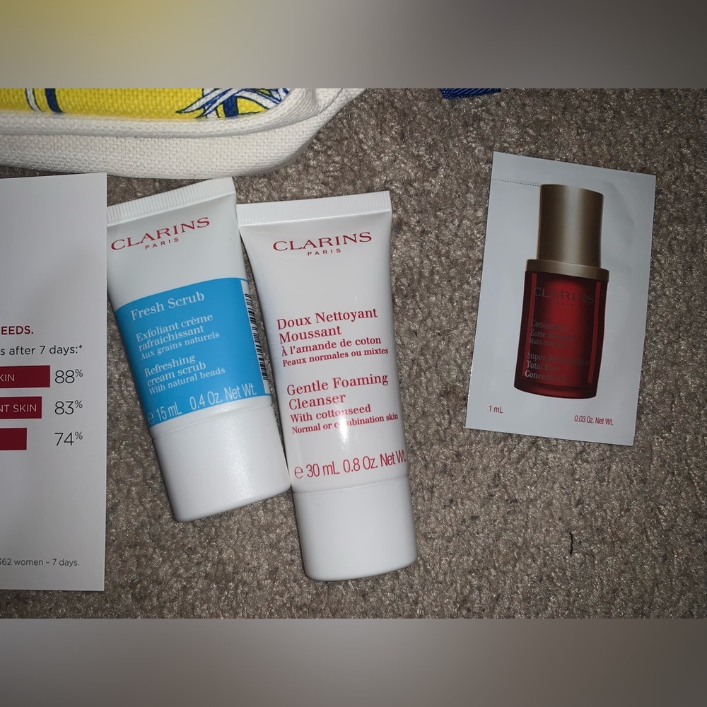NWOT. Clarins Skincare Sample Set with Yellow and White Bag - Picture 2 of 7